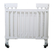 Load image into Gallery viewer, Baby Inc Stowaway – Folding Wooden Cot