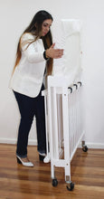 Load image into Gallery viewer, Baby Inc Stowaway – Folding Wooden Cot